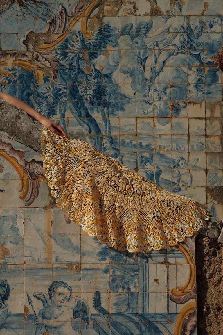 Crochet lace against Portuguese azulejo tiles